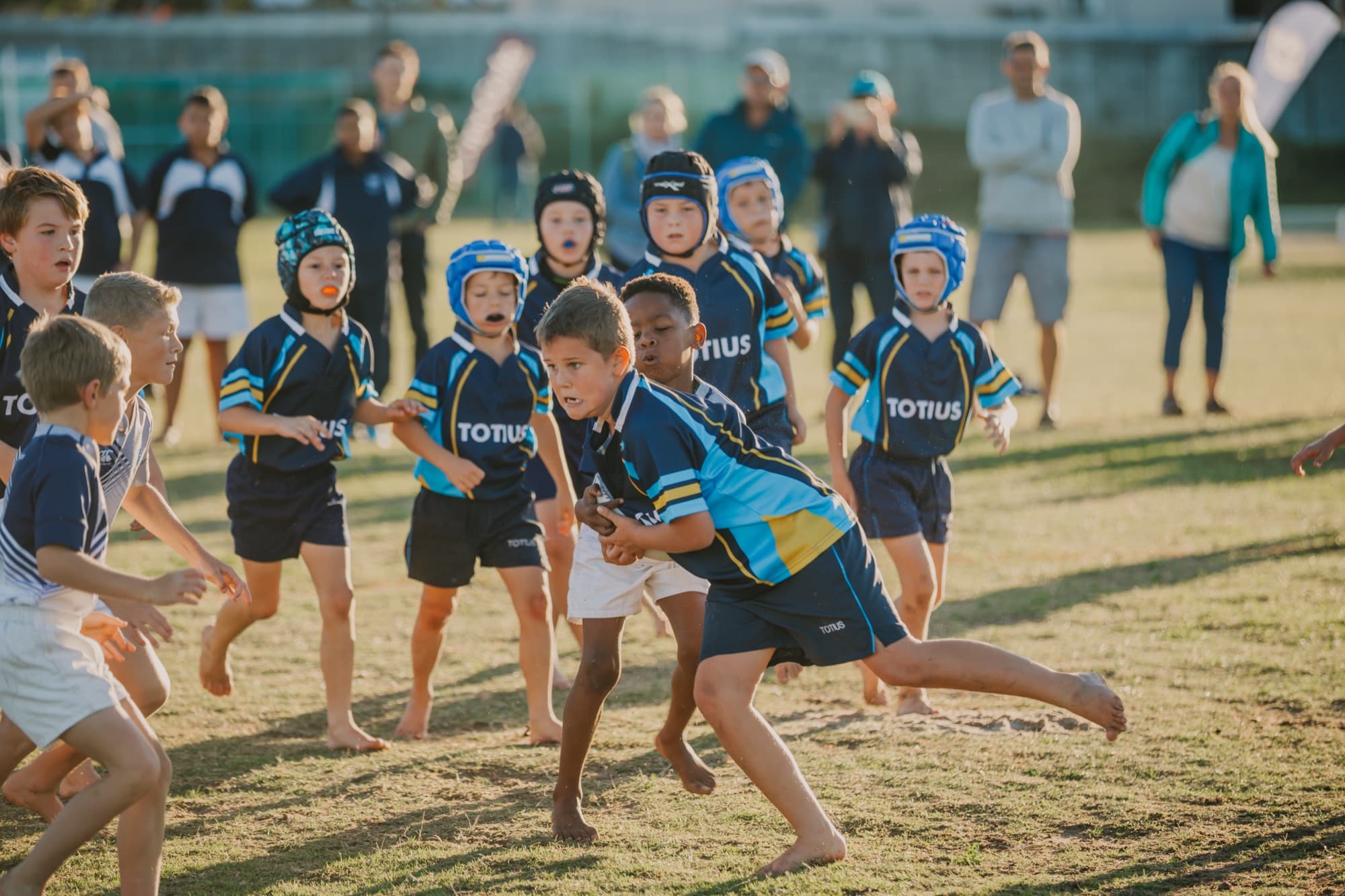 Jong Totius-rugbyspelers in wedstrydaksie.